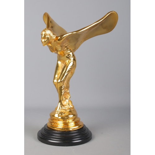 231 - A large Rolls Royce 'Spirit of Ecstasy' mascot, in gold finish on stepped circular base. Height: 36c... 