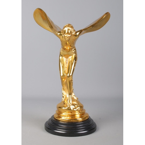 231 - A large Rolls Royce 'Spirit of Ecstasy' mascot, in gold finish on stepped circular base. Height: 36c... 