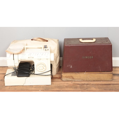 272 - Two Singer electric sewing machines, including one cased 185k example.