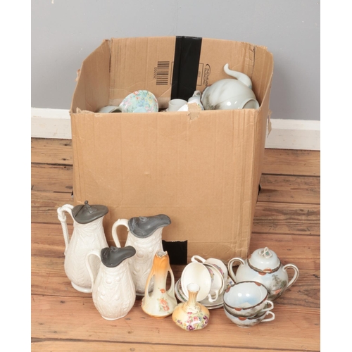 288 - A large box of assorted ceramics, to include examples from  Wedgwood Nankin, EM & Co chang bowl, blu... 