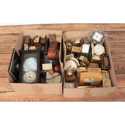 319 - Two boxes of clocks. Includes quartz carriage clocks, wall clock, alarm clocks etc.