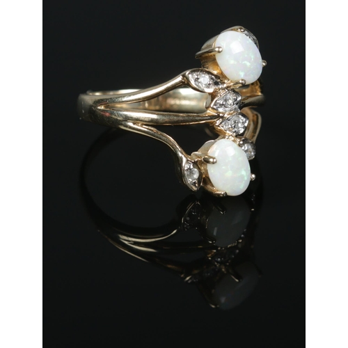 436 - A 9ct Gold opal and white sapphire dress ring. Size T½. Total weight: 4.4g