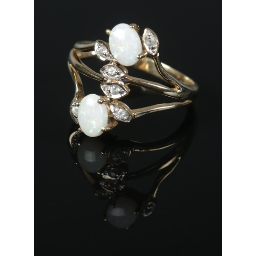 436 - A 9ct Gold opal and white sapphire dress ring. Size T½. Total weight: 4.4g