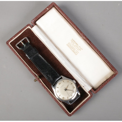 446 - A gents stainless steel Garrard automatic wristwatch in original box.