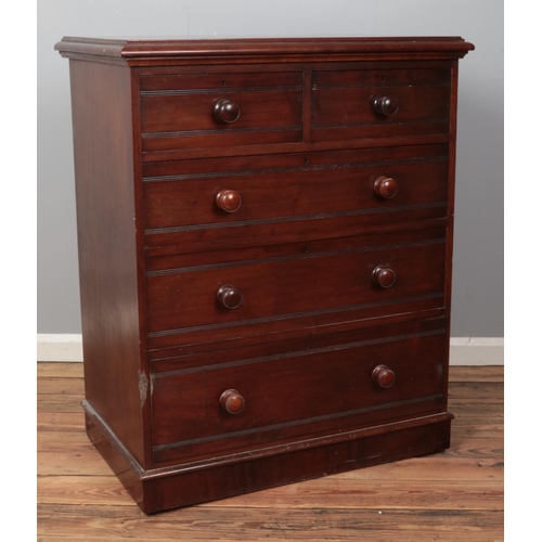 523 - A mahogany chest of two over three drawers, with lockable drawers. Raised on casters. Height: 111cm,... 