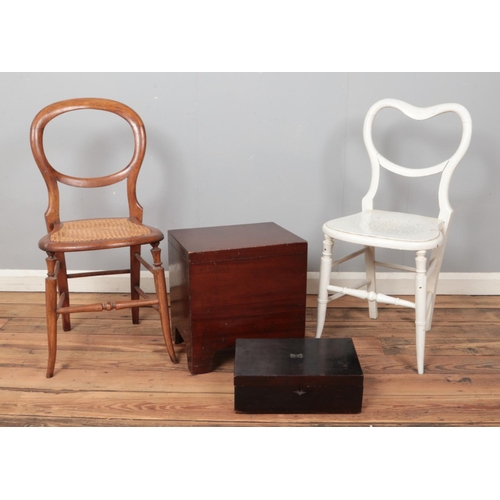 527 - Two balloon back chairs, one with bergère base, together with a mahogany sewing box and writing box.