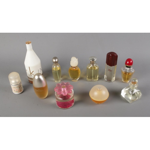 136 - A quantity of perfume bottles including Calvin Klein In2U her, Next Flowers, Incandescence, Samsara ... 