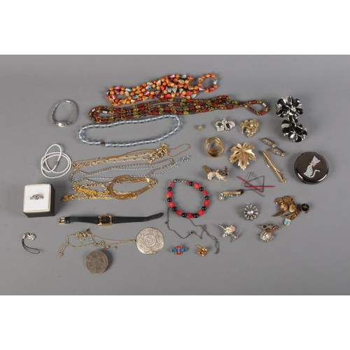 137 - A quantity of costume jewellery including necklaces, bracelets, Accua wristwatch and, possibly silve... 