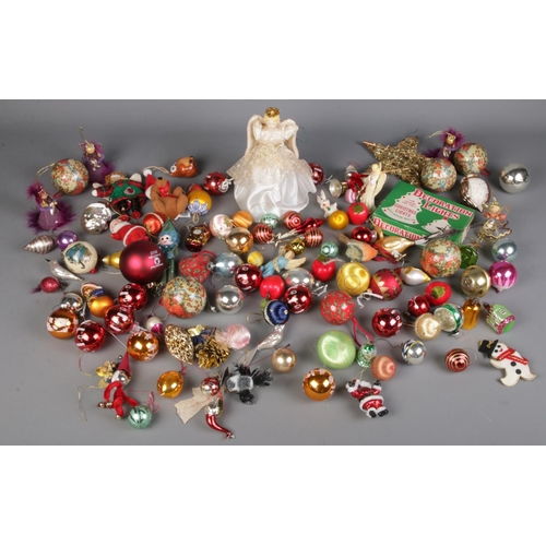 265 - A quantity of vintage Christmas decorations.