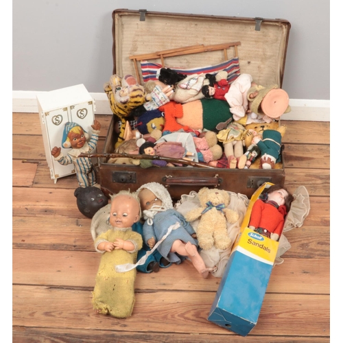 283 - A case of dolls, teddies and soft toys. Includes Sindy wardrobe and clothes.