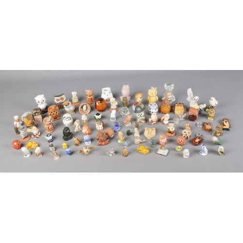 310 - A large quantity of small owl figures including Rose Quarts, ceramic and glass examples.