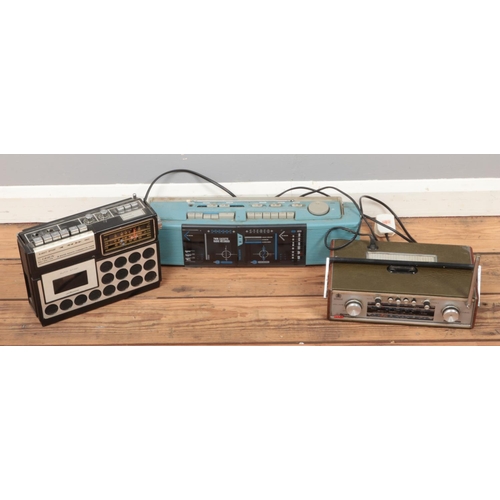 341 - A Roberts R606-MB radio along with two cassette players.