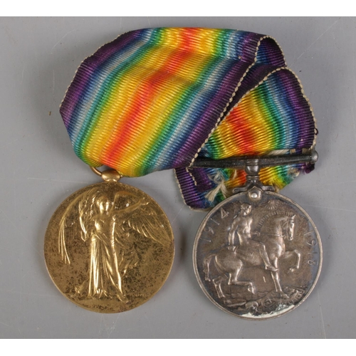 394 - Two WWII medals. Both inscribed to the edge. '21331 PTE.W.R. SCOTT'. Durham Light Infantry.