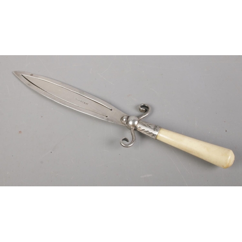 399 - A silver bookmark formed as a dagger with horn handle. 11cm.