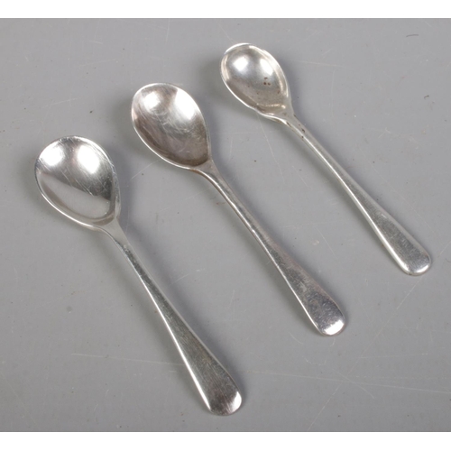 403 - Three silver salt spoons. 10g.