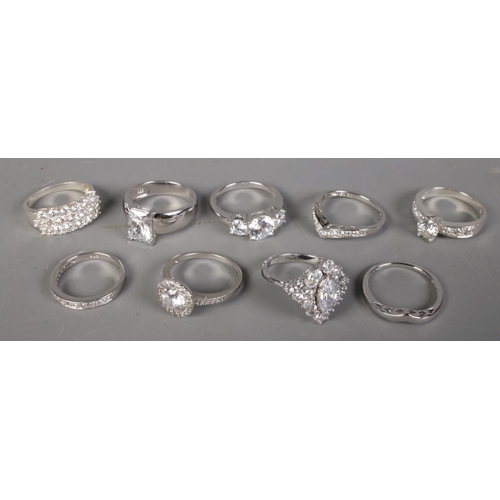 419 - Nine silver rings. Including cubic zirconia set examples, etc.