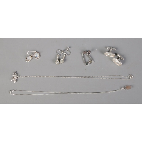 452 - A collection of silver jewellery including earrings, cufflinks and necklaces. Includes one pair of e... 