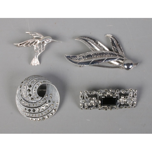 458 - Four silver brooches including hummingbird example and one hallmarked Birmingham 1967.