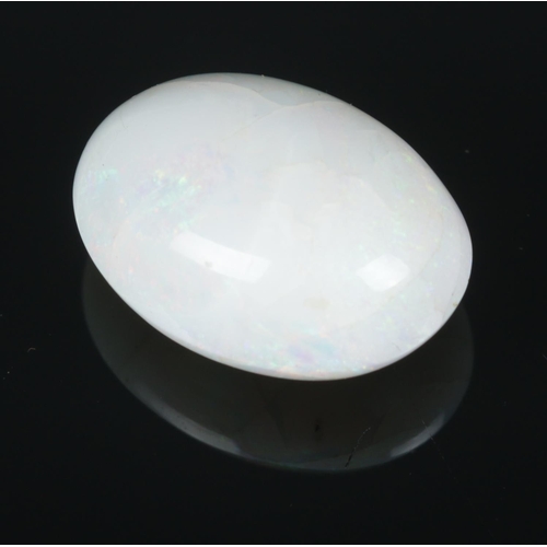 461 - An unmounted opal gemstone. Approx. dimensions 2cm x 1.3cm.