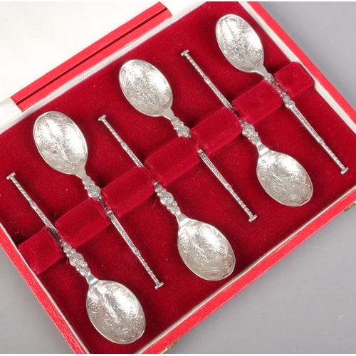 493 - A cased set of silver jubilee silver teaspoons. Assayed Sheffield 1977 by Bishton's Ltd. 59g.