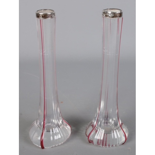 500 - A pair of glass specimen vases with coloured streaks and silver rim. Assayed London 1904.