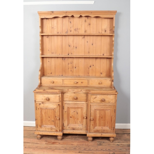 544 - A Victorian pine kitchen dresser.