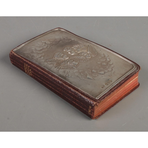 522 - A silver fronted pocket Book of Common Prayer, with assay marks for Chester, 1908, with partial make... 