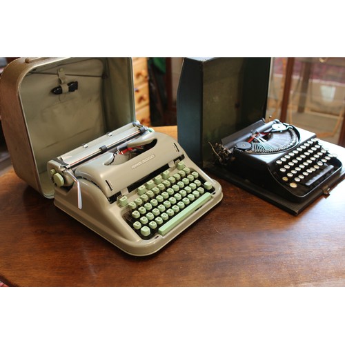 286 - Two cased typewriters. Including Hermes 3000 and Remington Portable.