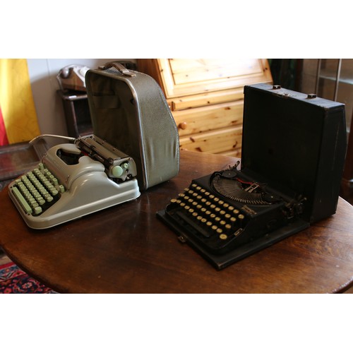 286 - Two cased typewriters. Including Hermes 3000 and Remington Portable.