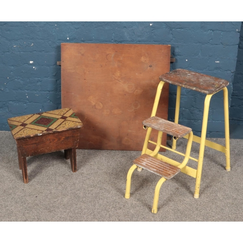 614 - A folding table along with a small pine work box and folding steps.