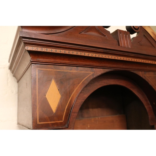 626 - A Georgian mahogany longcase clock case, featuring double swan neck pediment and diamond marquetry b... 