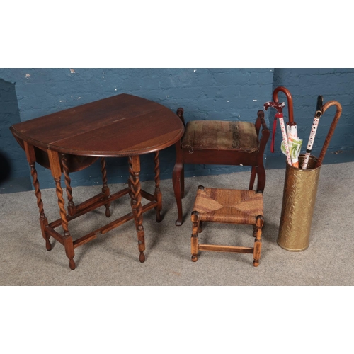 642 - A quantity of assorted furniture to include drop leaf table and stools.