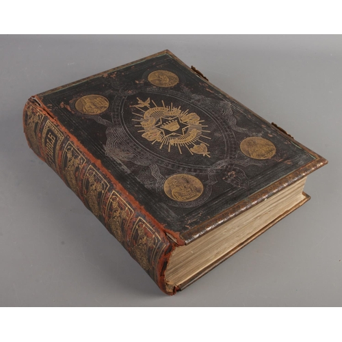 106 - A Brown's leather bound family bible. By Rev. John Brown. Published by Edward Slater, Cononley, near... 