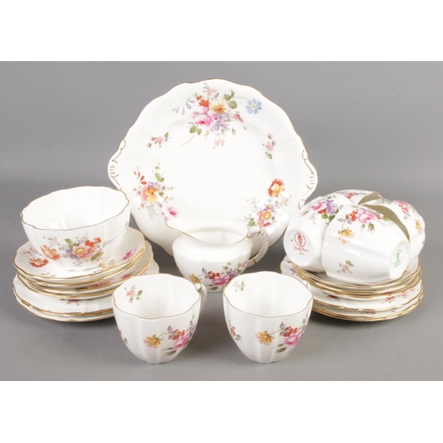 113 - A Royal Crown Derby bone china tea set in the Derby Posies design.