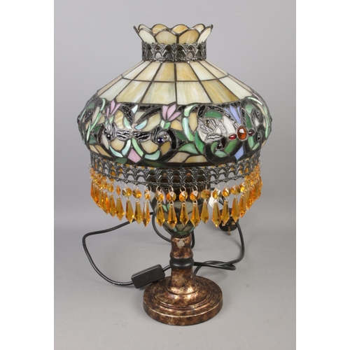 117 - A Tiffany style table lamp featuring beaded fringe decoration to shade.