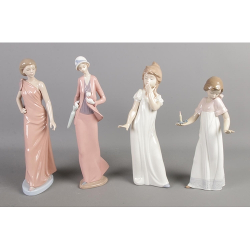 152 - Four NAO by Lladro ceramic figures, to include girl with candle and woman with parasol and cat.