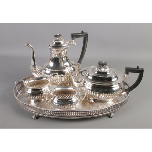 162 - A Sheffield silver plated tea set on Allander gallery tray.