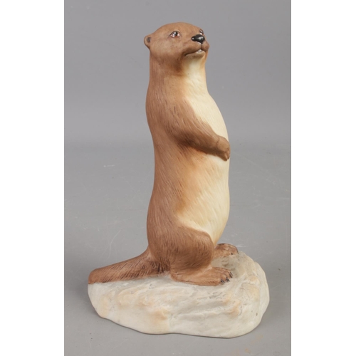 163 - An Aynsley model of an Otter, stamped to base. 16cm high.