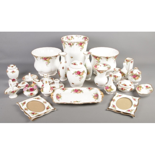 169 - A quantity of Royal Albert Old Country Roses ceramics. Includes vases, bowls, candlesticks, picture ... 