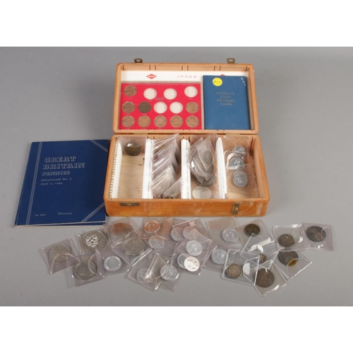 172 - A collection of coinage and tokens, to include Great British pre-decimal examples, 1854 four pence a... 