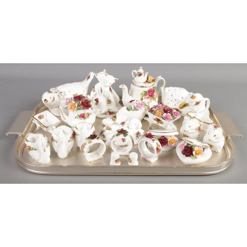 2 - A tray of Royal Albert Old Country Roses ceramics. Includes novelty teapot, cat figure group, napkin... 