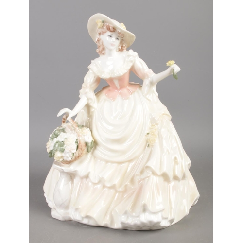 3 - A Limited Edition Coalport figure; 'Harvest Gold'. No. 1200/7500. In good condition, with certificat... 