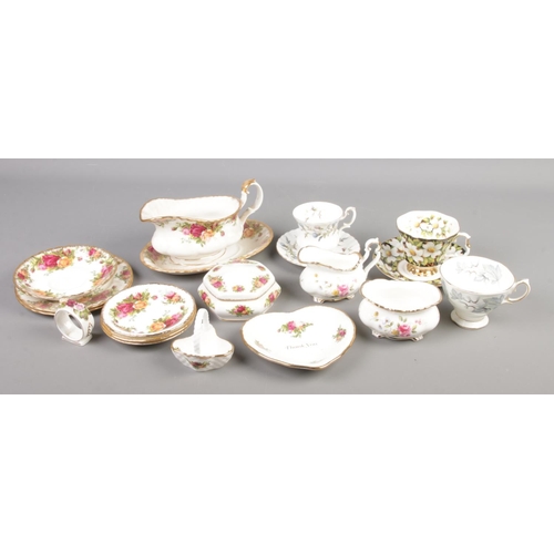 37 - A collection of Royal Albert bone china. Includes Dogwood, Brigadoon, Old Country Roses, Silver Mapl... 
