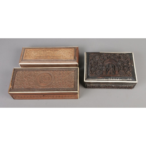 39 - Three decorative carved boxes featuring bone and Vizagapatam detail.