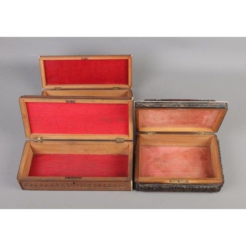 39 - Three decorative carved boxes featuring bone and Vizagapatam detail.