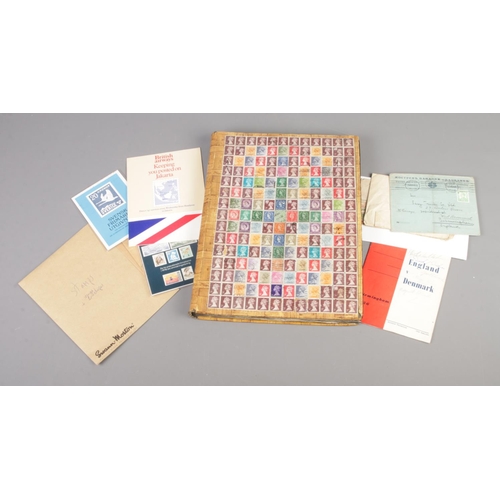 48 - A collection of assorted stamps, ephemera and vintage photograph album of various places in Great Br... 