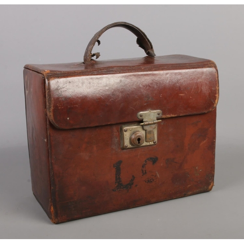 5 - An antique doctors case, with contents. To include bottles, name plaque and medical instruments