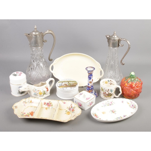 62 - A collection of ceramics and glass. Includes Claret jugs, Royal Winton, Coalport, Carltonware etc.