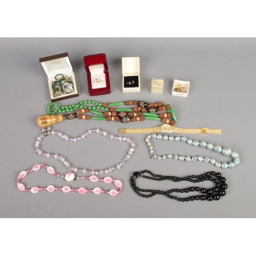 72 - A quantity of assorted costume jewellery including beaded necklaces, ring, earrings, etc.