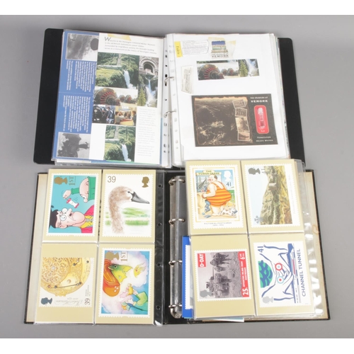 78 - An album of Royal Mail postcards and first day covers along with a album detailing Norway's Operatio... 